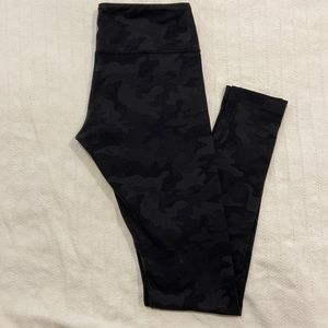 LuluLemon leggings. Black with pattern. Size 6.